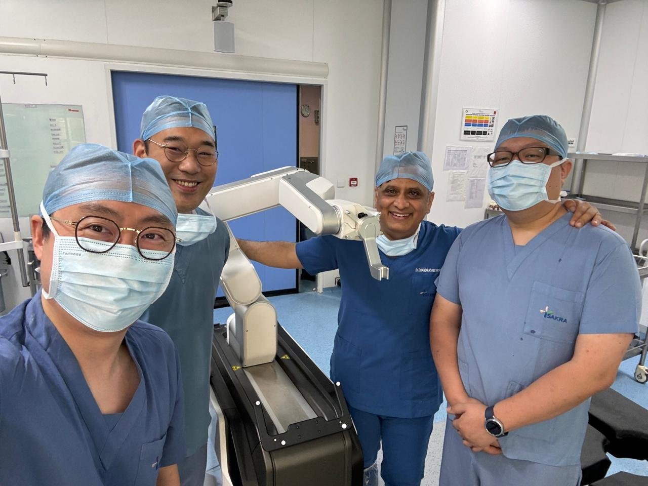 Fellows with robotic arm